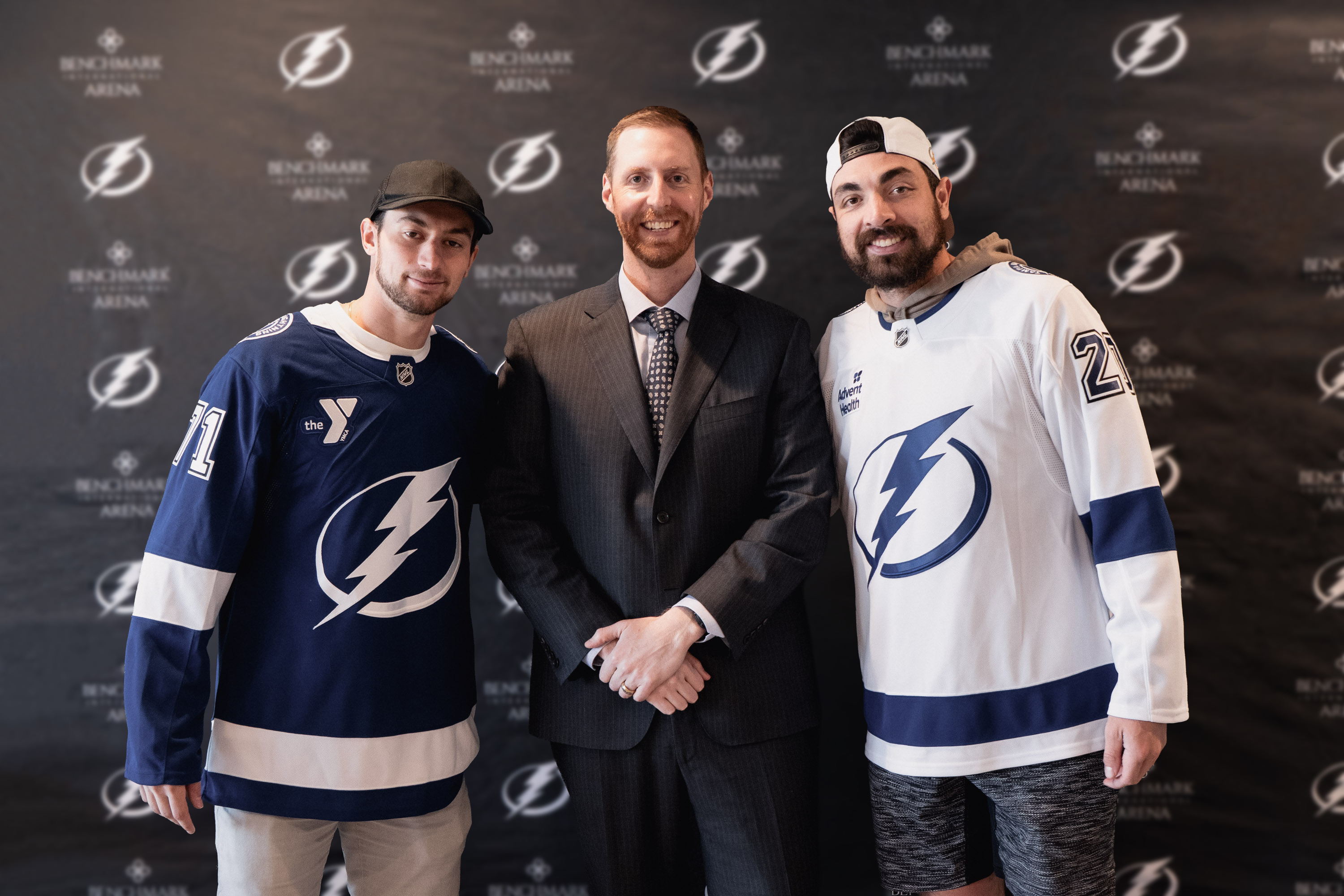 Image of Anthony Cirelli and&nbsp;Nick Paul&nbsp;with Tyrus O'Neill.